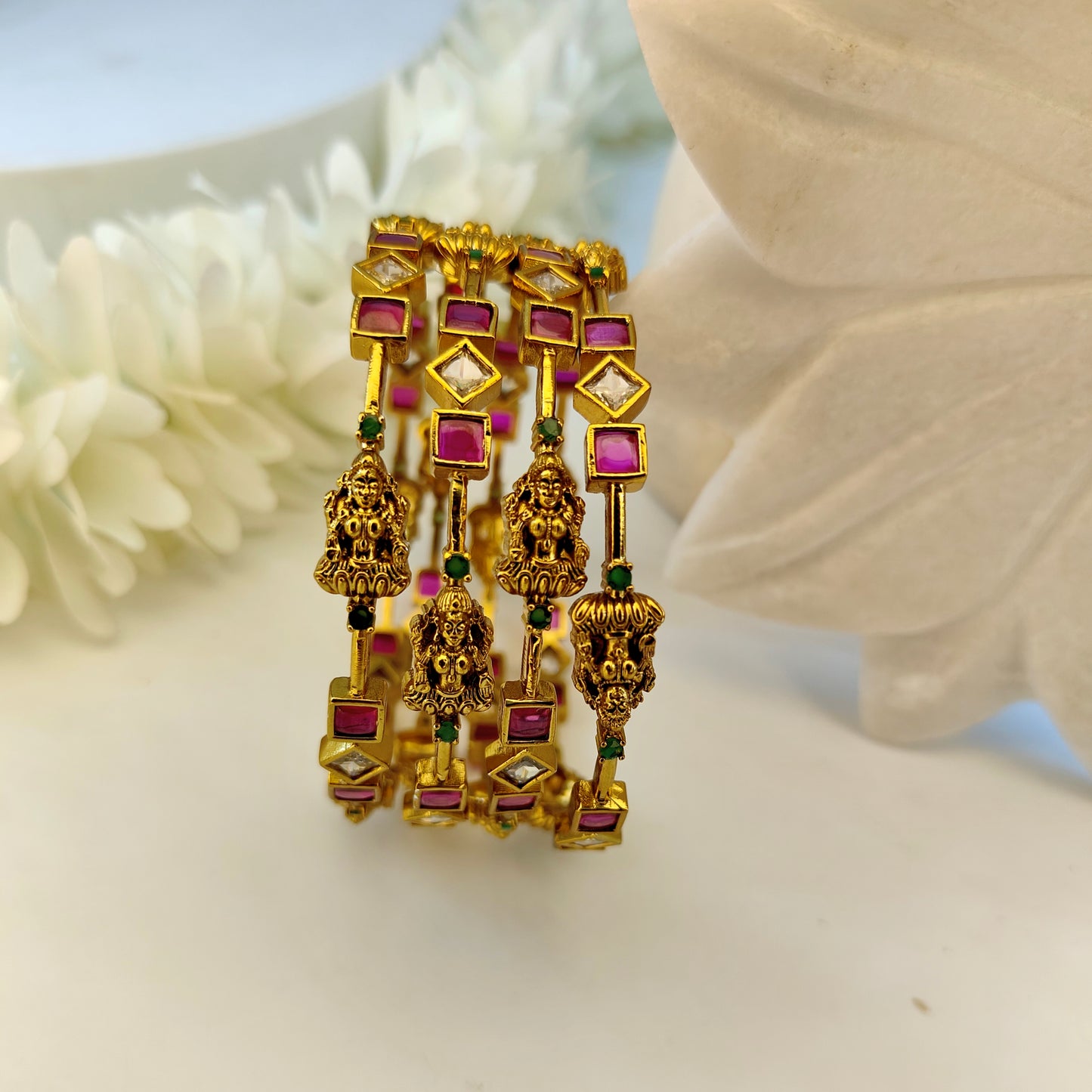 Ruby set of four Lakshmi ji motif bangles