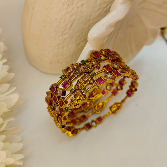 Ruby set of four Lakshmi ji motif bangles