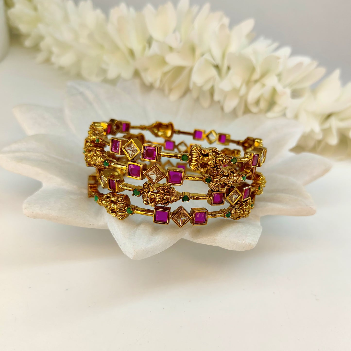 Ruby set of four Lakshmi ji motif bangles