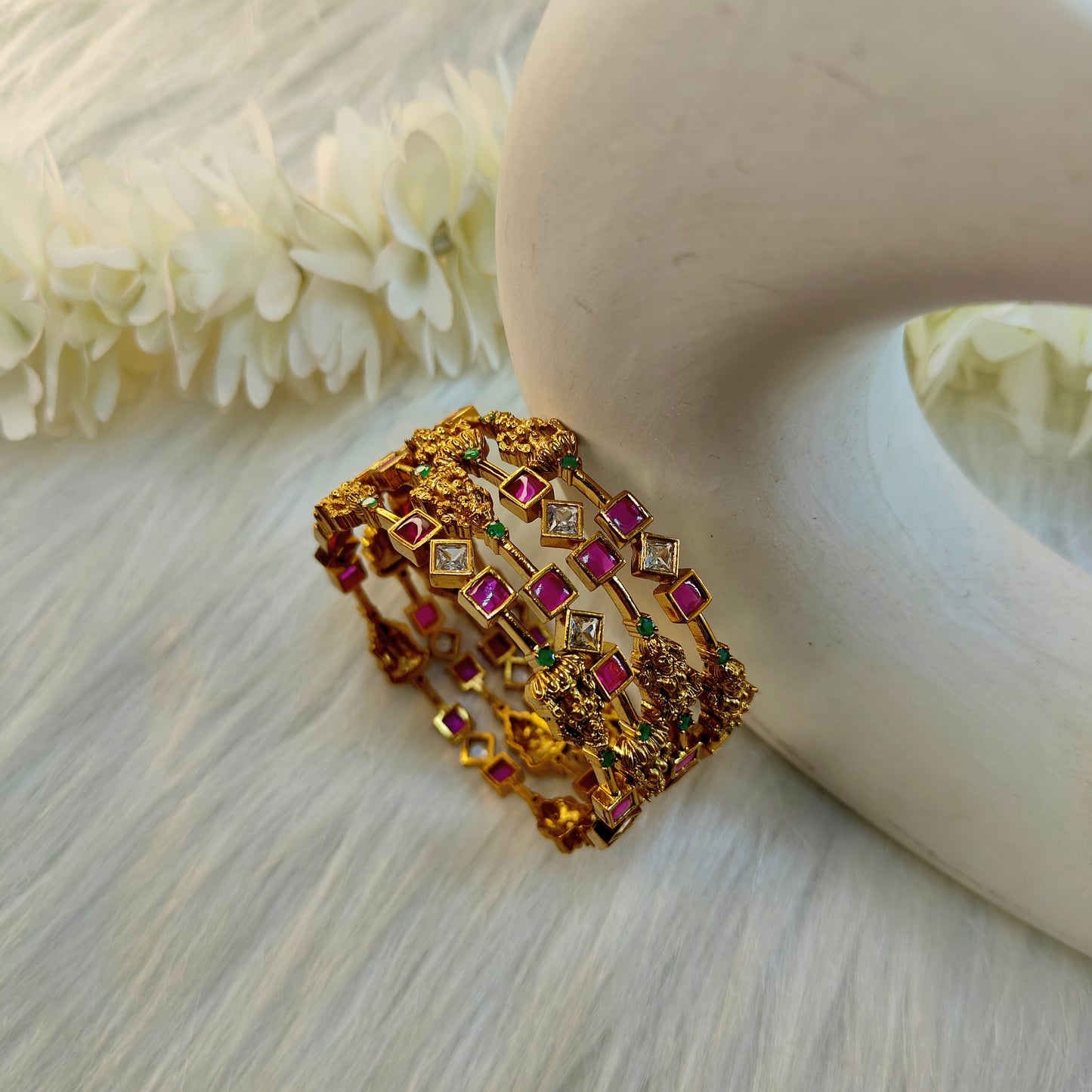 Ruby set of four Lakshmi ji motif bangles